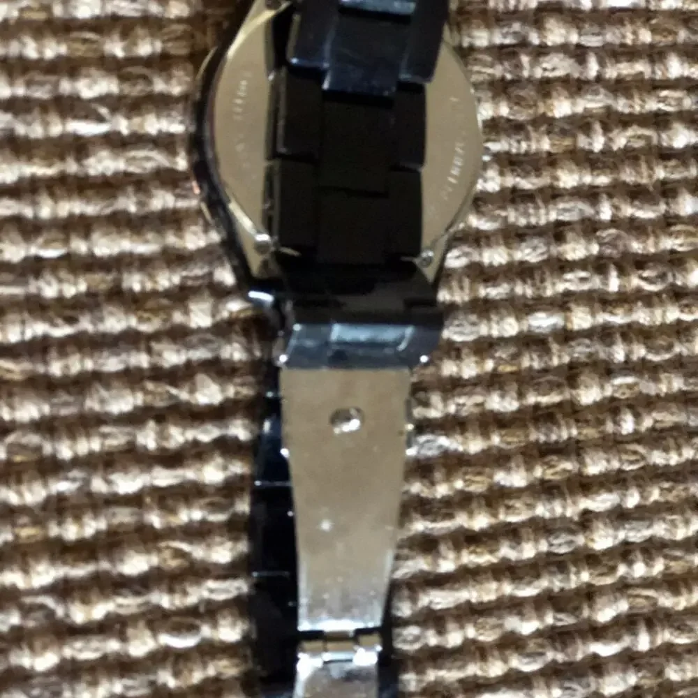 Fossil black resin watch w/ rhinestone face